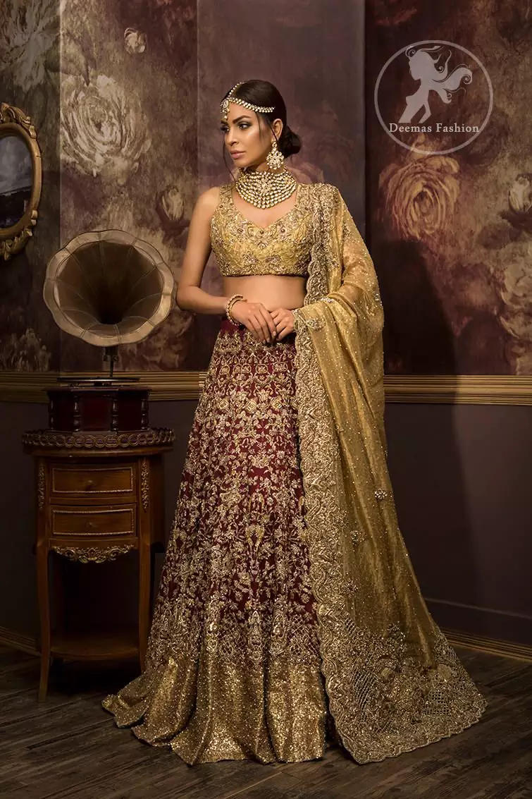 Maroon and gold bridal 2024 lehenga