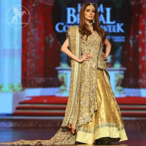 Golden organza lehengha comes with pure crinkle chiffon dupatta having heavy embroidery. Dress comes with front open long back trail