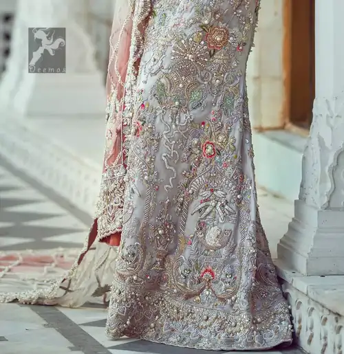 Ivory white long fitted bridal maxi. Maxi adorned with colorful embellishment using appliques and threads. Bridal maxi comes with two