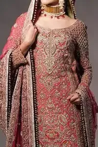 Tea rose fully embellished shirt with plum applique border on hemline. Plum dupatta adorned with tea rose and silver appliques having black finishing. Tea rose fully embellished lehenga with small motifs having plum applique border on hemline.