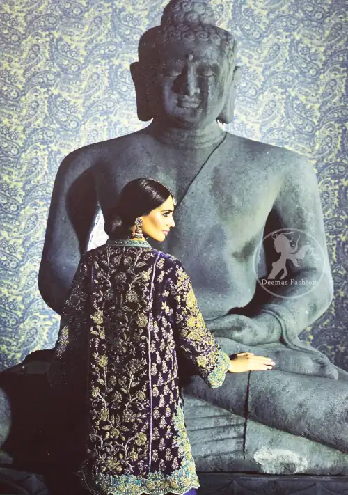 This classic shirt is reflecting exuberant colours. Kurta style shirt meticulously highlighted with antique kora, dabka, pearls and sequins. It