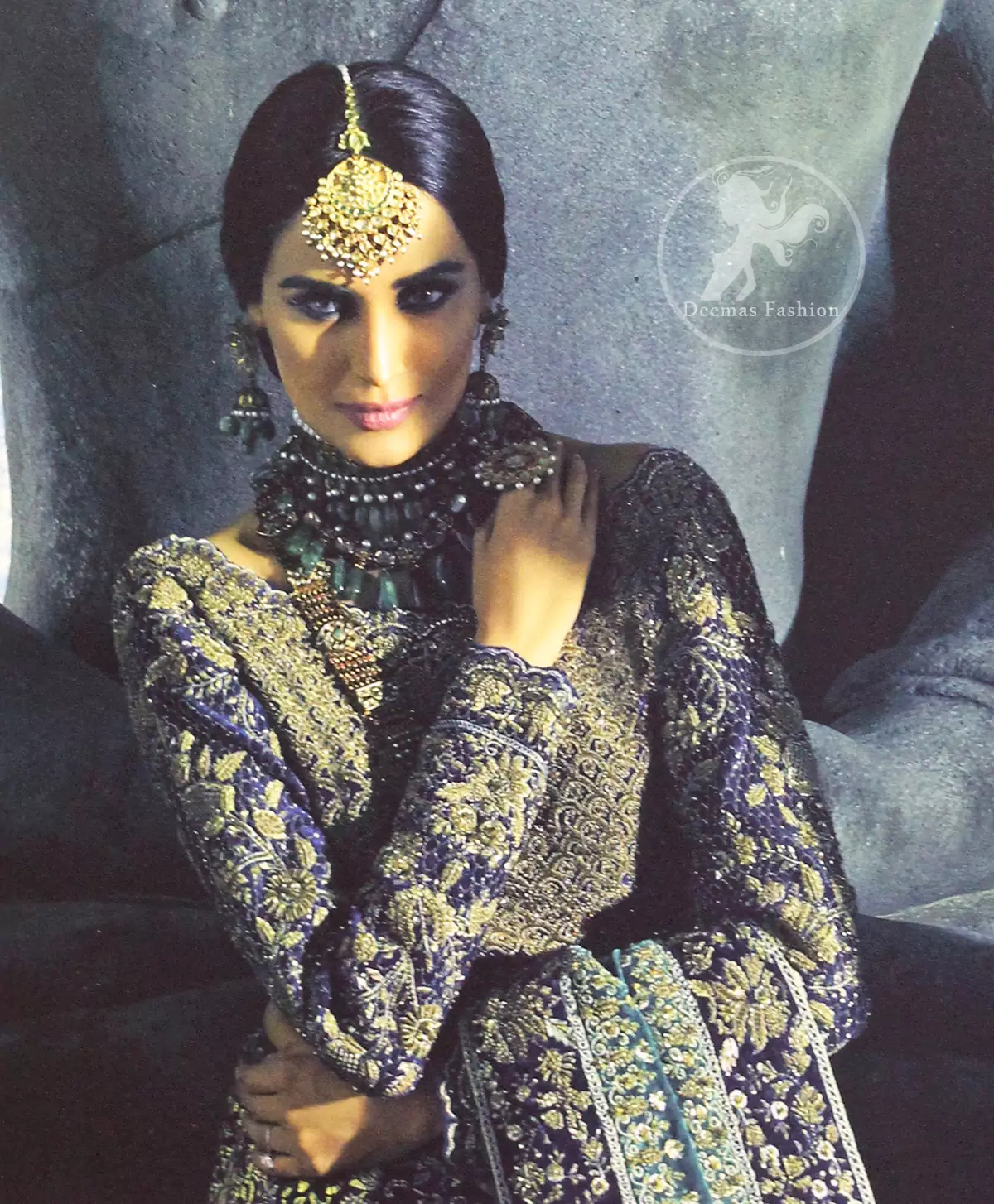 Violet Blue Blouse is of velvet fabric. It is heavy embellished ful sleeves blouse featuring antique and golden shaded kora, dabka, resham, naqshi, pearls, crystals and swarovski. Blouse is fully scalloped with blue bayoux resham outline. sleeves are adorned with floral work and sprinkling sequins/naqshi on it, while bodice having crossing heavy pattern all over it. It comes with raw silk lehengha which is adorned with block printing. It is artistically coordinated with blue bayoux dupatta which is adorned with fully embellished appliqued borders. Borders are accompnied by delicate work along its internal sides. There are four embellished heavy flowers on corners and small floral pattern all over it.