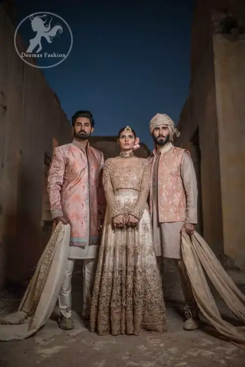 Tea Rose floor length style Anarkali which is fully panelled, embellished with sculptured floral embroidery. Its bodice is fully embroidered