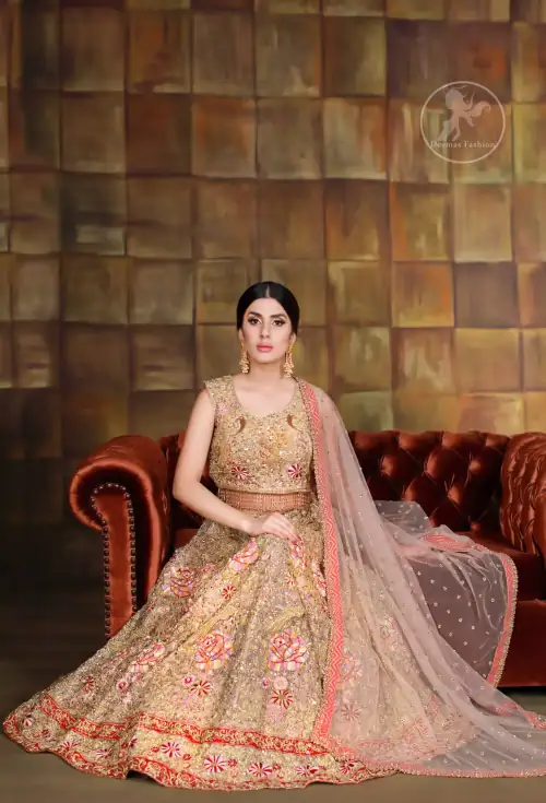 Blouse is fully embellished and decorated with tassels. Lehengha is embellished with different shaded thread embroidery, allured with kora, dabka,