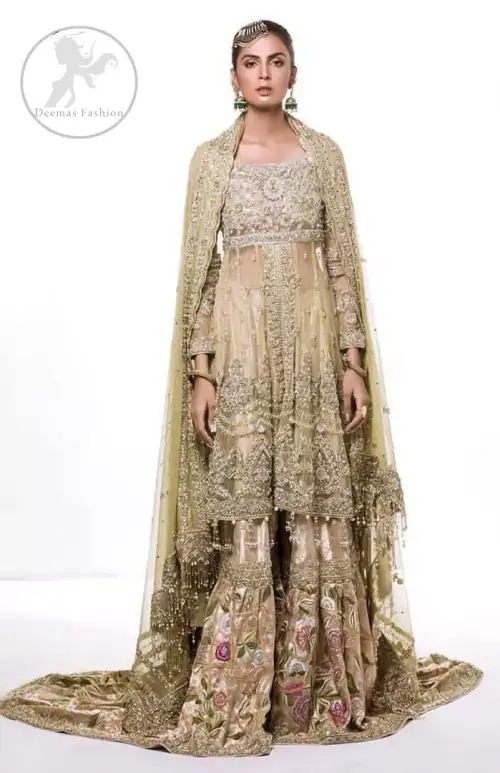 This dress is beautifully sculptured with floral embroidery. It is meticulously highlighted with antique shaded kora, dabka, tilla, sequins and