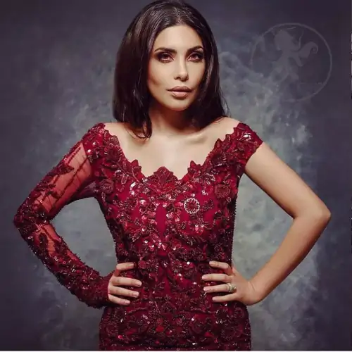 This outstanding maroon short shirt fully embellished with floral embroidery. It is allured with maroon antique shaded kora, dabka ,