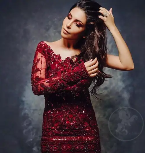 This outstanding maroon short shirt fully embellished with floral embroidery. It is allured with maroon antique shaded kora, dabka ,