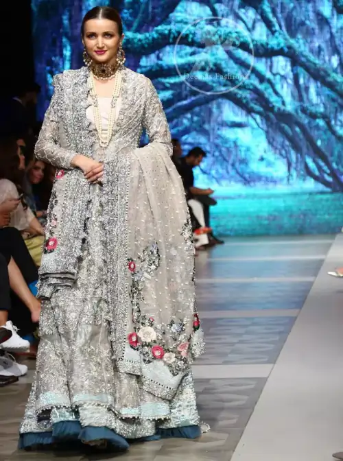 This outfit is a timeless beauty. It is heavily embellished with silver gold kora dabka, Sequins and swarovski crystals. This