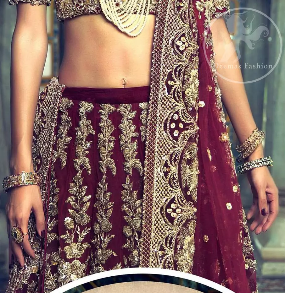 This outfit is meticulously highlighted with antique shaded kora dabka, tilla, sequins and swarovski. This dress is beautifully sculptured with floral embroidery. Shirt is fully embellished. It is artistically coordinated with embellished lehenga. Lehenga is enhanced with floral motifs and fully fully embellished with kora dabka embroidery. It comes with chiffon dupatta, having four sided embellished border and sprinkled with sequins all over it.