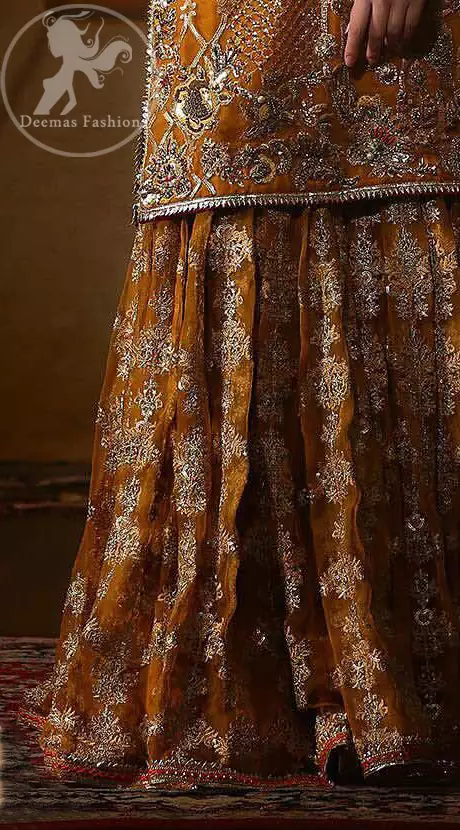 This exquisite shirt is fully decorated with floral and different motifs patterns all over it. This dress is beautifully decorated with heavy embroidery. It is highlighted with kora, dabka, tilla, sequins and pearls. Lehengha is fully embellished with tilla work. It is artistically coordinated with net dupatta which is embellished.