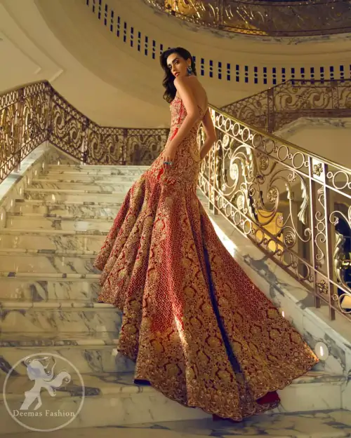 This bridal blouse executing heavily handcrafted art of zardozi. This dress is beautifully decorated with heavy embroidery. It is highlighted