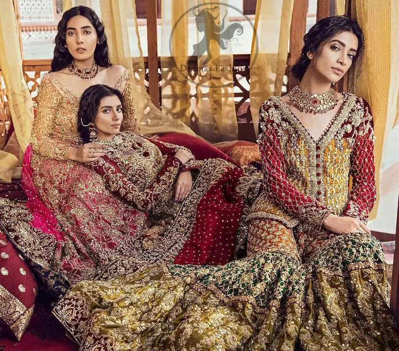 The grand gold bridal stands out due to its uniqueness and the perfect fusion of modern cut and traditional embroidery. This dress is beautifully decorated with heavy embroidery. It is highlighted with kora, dabka, tilla, sequins and pearls. It comes with heavy embroidered gharara. It is coordinated with chiffon dupatta which is sprinkled with sequins all over it. It is allured with four sided embellished borderand beautiful tassels adds to the look.