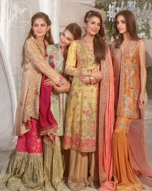 This super stunning back trail shirt is made of rich floral embroidery which is further enhanced with zerdosi work. It