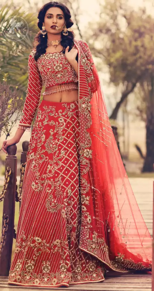 Boost your confidence and style in this glamorous blouse skirt with finest embroidery. The blouse is ornamented with light gold