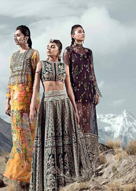 This dress is beautifully decorated with heavy embroidery. It is highlighted with dull golden kora, dabka, tilla, sequins and pearls. Fish lehengha is fully embellished.Blouse is scalloped. It comes with beautifull upper gown, sprinkled with sequins all over it. It is coordinated with chiffon dupatta which is sprinkled with sequins all over it.
