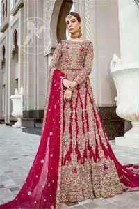 Delicately crafted and personifying chic elegance with an element of grandiose.  Heavily embellished in the front with intricate embroidered pattern done with dull golden kora, dabka, kundan, tilla and sequins. The lehnga with embroidered motifs pattern all over and finished with thick kora and dabka borders completes the look. It is coordinated with tissue dupatta which is sprinkled with sequins all over it. It is further furnished with four sided embroidered border.