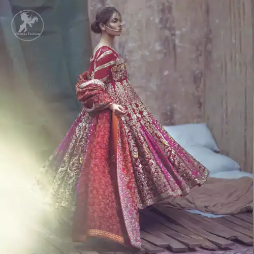 Captured in traditional silhouette, this frock bursts of vibrant colors and sumptuous details of zardozi, kora and dabka is a