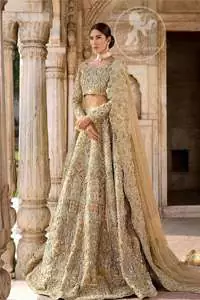 The grand gold bridal stands out due to its uniqueness and the perfect fusion of modern cut and traditional embroidery. This outfit is made of rich floral embroidery and different styles motifs which is further enhanced with zardoze work. It is highlighted with kora, dabka, tilla, sequins and pearls. Heavily embellished lehnga with embroidered motifs spread all over and finished with thick kora and dabka borders completes the look. It is coordinated with beautiful dupatta with thick matha patti border on the front and intricate beautiful border on all rest of the three sides. Furthermore it is enhanced with sprinkled sequins all over it.