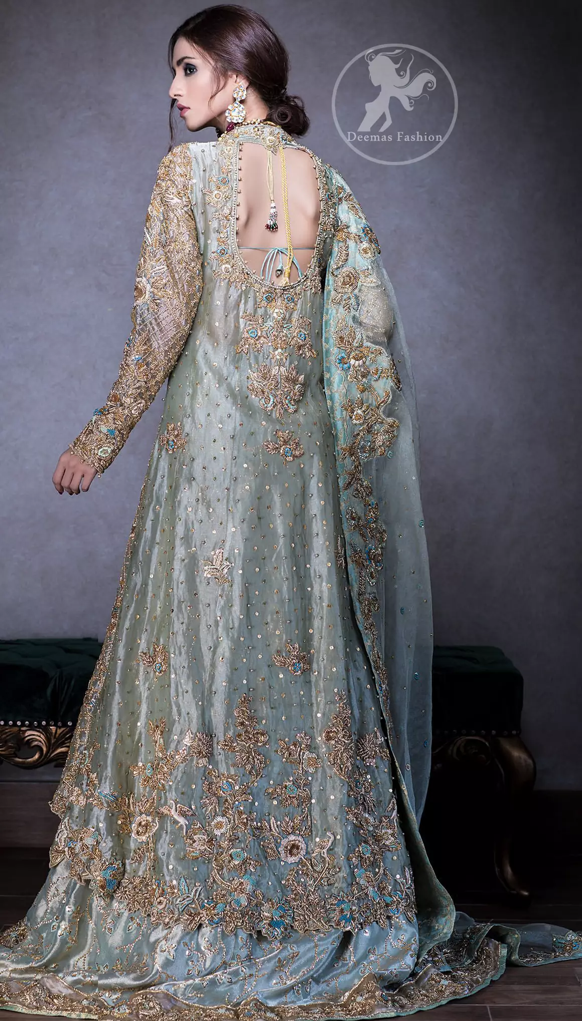 This regal regent gray outfit is an immensely captivating traditional piece, enhancing the art of classical heritage showcasing the craftsmanship of kora, dabka & mukesh detailed with pearls; artistically embellished to give a beautiful rhythm to the outfit. Gown is heavily embellished with antique zardosi work and floral thread embroidery. It comes with embellished lehenga enhanced with embroidered applique on the bottom. It comes with organza dupatta with embellished scalloped border at all ends.