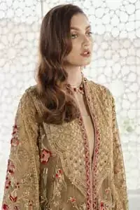 This elegant ensemble turns timeless piece into a chic fantasy. Perfect for this festive season with divine detailing of thread embroidery, color balance and well-crafted zardosi work. Furthermore it is elevated by vibrant floral motifs and red embellished slits. It comprises with self printed sharara ornamented with captivating embellished bottom. Style it up with matching organza dupatta with chann all over.