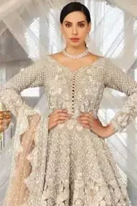 Paint a picture of pure elegance with this beautiful pishwas. This dress is beautifully sculptured with floral embroidery, adorned with geometric patterns embellished with silver kora, dabka, pearls and sequins work all over. The detailed scallop border gives a perfect ending to this pishwas. The lehenga is emphasized with embellished bottom that gives perfect ending to thisoutfit. It is coordinated with net dupatta sprinkled with chann all over and finished with embroidered border on four sides which makes this outfit more beautiful.