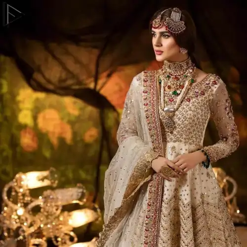 Delicately crafted and personifying chic elegance with an element of grandiose. This outfit is beautifully sculptured with geometric embroidery, adorned