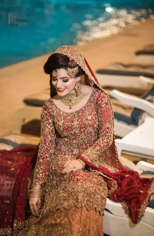 Pakistani Reception Wear - Maroon Shirt – Rust and Maroon Lehenga. You are all set to make a lasting impact