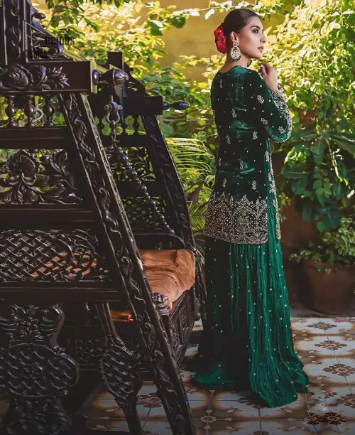 This mehndi outfit is a true example of decorative and ornamental expression stylized in a contemporary way. The dress comes