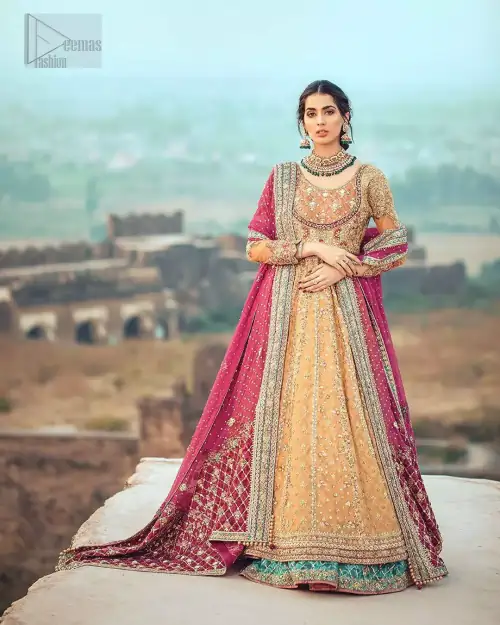 This exceptionally detailed anarkali frock is cut in a seductive fit and flare silhouette that’s sure to turn heads. The