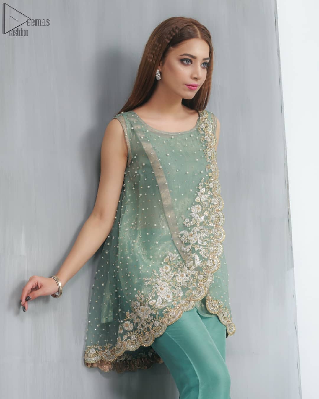 This outfit should be the next addition to your wardrobe. Gussy up the glamour with this intricately embroidered Sea Green ensemble accentuated with floral motifs and finished with scalp borders. An example of beauty and elegance. Look breathtakingly stylish in this embroidered regalia furnished.