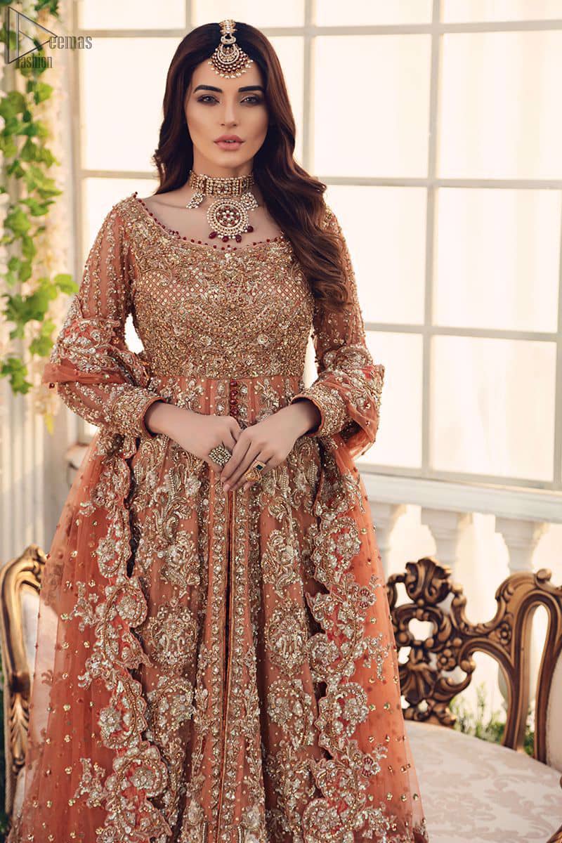 Pakistani Bridal Wear Salmon Front Open Gown - Maroon Back Train Lehenga - The front open dreamy gown is adorned with an embellished bodice, sleeves and embroidered daaman is giving a perfect ending to this flare.