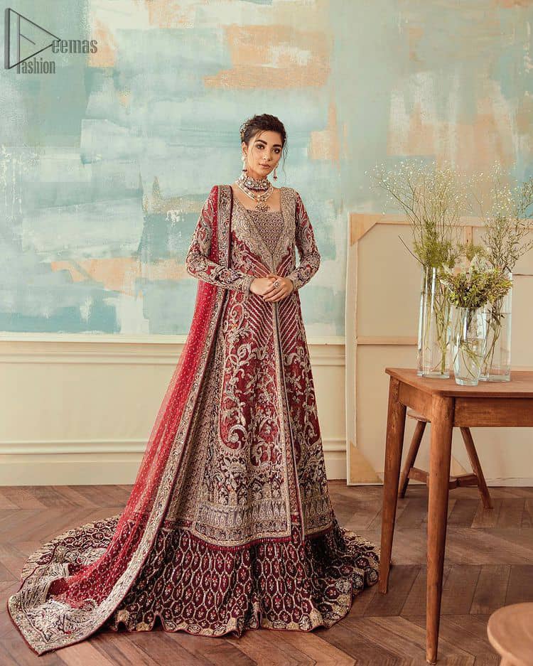 Deep red jacket gown having inner velvet blouse with maroon back train lehenga and heavily embroidered dupatta.