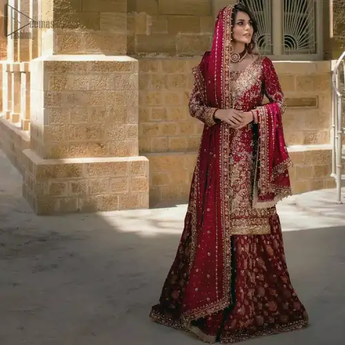 Style up on your big day with Deemas Fashion's meritorious crimson Lehenga. Designed with a round neckline, the shirt is