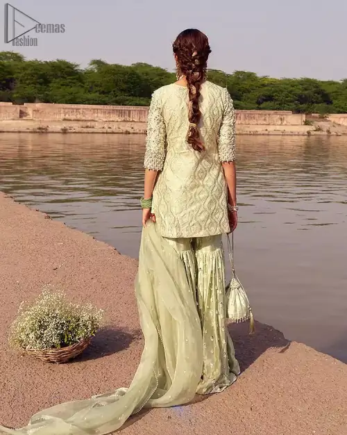 Glow up an evening formal event with a Light Parrot Green Gharara Shirt, a beautiful three-quartered sleeves shirt designed with