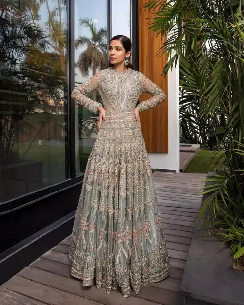 Pastel Green Large Flared Anarkali - Pakistani Wedding Gown. The bottom part of this amazing outfit comprises a lehenga with