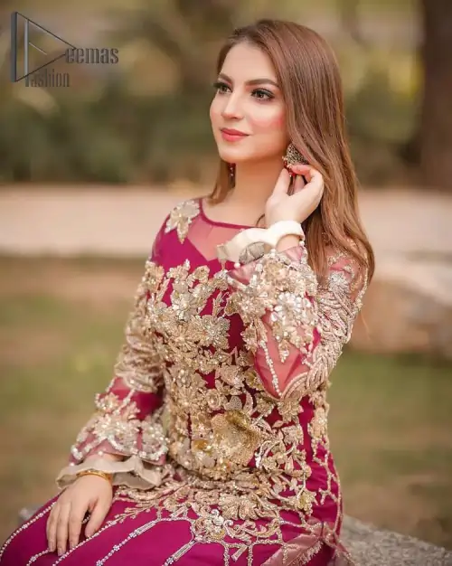 Take a step towards refreshing your wardrobe with a Shocking pink long Shirt. This dress is allured with floral embroidery.