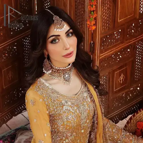 The shirt is the mirror of the mind and the dupatta confesses secrets of the heart. This mustard soft-toned article