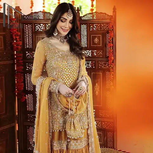 The shirt is the mirror of the mind and the dupatta confesses secrets of the heart. This mustard soft-toned article