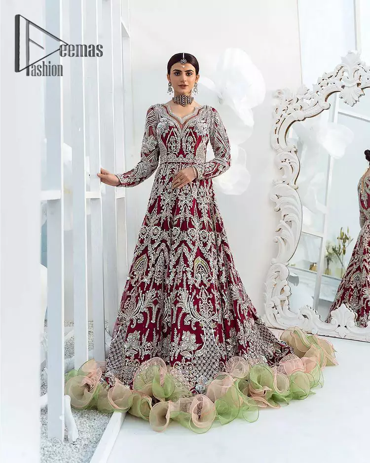 We're sure the majority of you women love slipping into "red outfits for weddings". So, Deemas Fashion presents undeniable vivacity and charming glam of red which makes a bride steal everyone's heart. This red full-sleeved maxi is made with pure organza and is adorned with silver embroidery that includes kora, dabka and tilla work. Moreover, the sweetheart neckline of the maxi is also giving a dazzling effect to this super outfit. Pair it up with a red dupatta that is embellished with four side borders and sequins spray all over that gives you a stylish and aesthetic look on your big day.