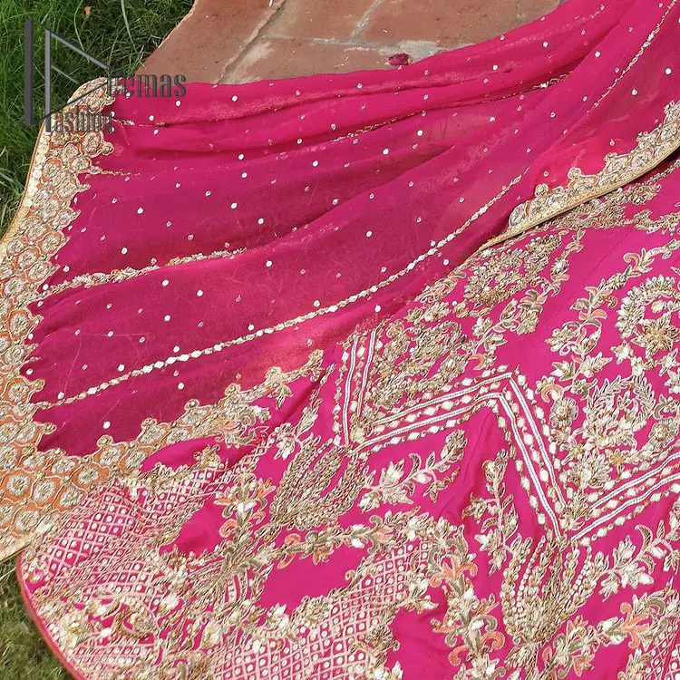 A color splash is always a floral dream. Let your energy shine with these popping Shocking Pink blouse that is ornamented with golden embroidery that involves tilla, dabka, Resham, and multi-color thread work just to magnify the display of the outfit. In addition to this, the full sleeves of the blouse when combined with a square neckline it gives a dazzling effect to the article. It is beautifully organized with can can lehenga that is also embellished with golden embroidery as well. Finalize this article with the same color dupatta that is adorned with four-sided lace and sequins spray all over just to fulfill your floral dream on your walima day.