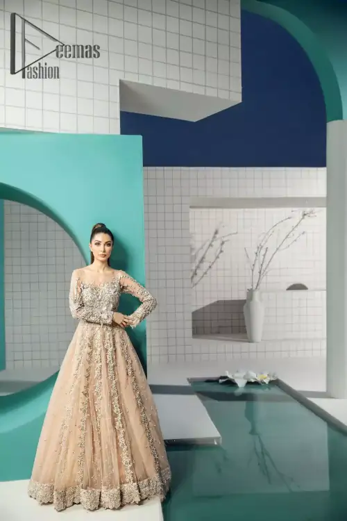 Unleashing your inner evocation of feeling about love and imagination. The Beige scalloped maxi is attractively adorned with silver embroidery