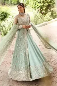 Stressed about your outfit on Walima?  Deemas Fashion will save your day. Make your moments more memorable with our ice blue front open maxi that is adorned with silver tilla, kora, and crystal work to enhance the beauty of maxi. In addition to this, the beauty of the square neckline of the stunning maxi speaks itself on your day. It is synchronized with the lehenga that's the border is as pretty as look in the picture. Finish this look with a dupatta that personifies the delicate embroidery on four sides and sequins detailing all over just to save your memorable day and give you a fairy look.