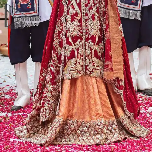 The majestic red signs a melody just for you. The handsome scalloped frock is made in the richest shade of