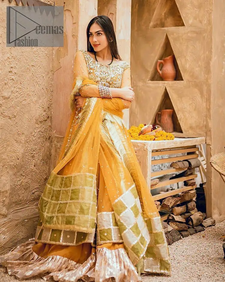 Mustard is just associated and boosts your Mehandi. Presenting a dreamy mustard frock with a heavily embroidered bodice on a