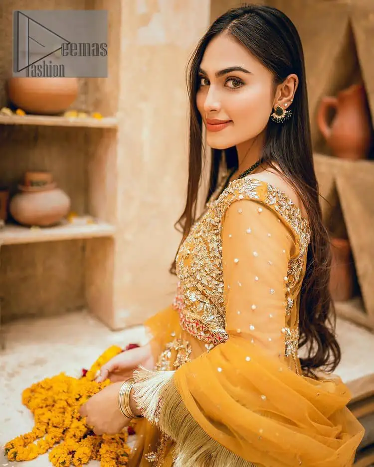 Mustard is just associated and boosts your Mehandi. Presenting a dreamy mustard frock with a heavily embroidered bodice on a