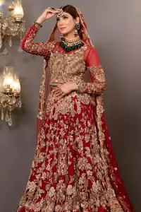 Take your style up a few notches with this bold yet elegant piece on your Big day. This red full sleeves habitual blouse choli is remarkably made with pure organza, styled easily and graciously with boat shape neckline and fully embellished with tilla, kora , dabka work. In addition to this, the frilled lehenga is also fully embellished with heavy embroidery that perfectly enhance your dazzling style on your big day. Finish this look with a red dupatta that have sequins spray all around and embellished with a four-sided scalloped border as well.