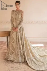 Something to Beige about! This nikah wear article is specially presented by DeemasFashion featuring thoughtfully designed ensembles with a rich beige colour maxi and dupatta that are flattering on the body's quintessential details. The Jewel neckline of the nikah wear maxi is attractively combined with the back train that is heavily adorned with light golden dabka, tilla, zardozi embroidery for the finest look. In addition to this, it is paired up with the same colour dupatta that is again ornamented with a four-sided border and sequins spray all over to fulfil your finest promising look on your nikah day.