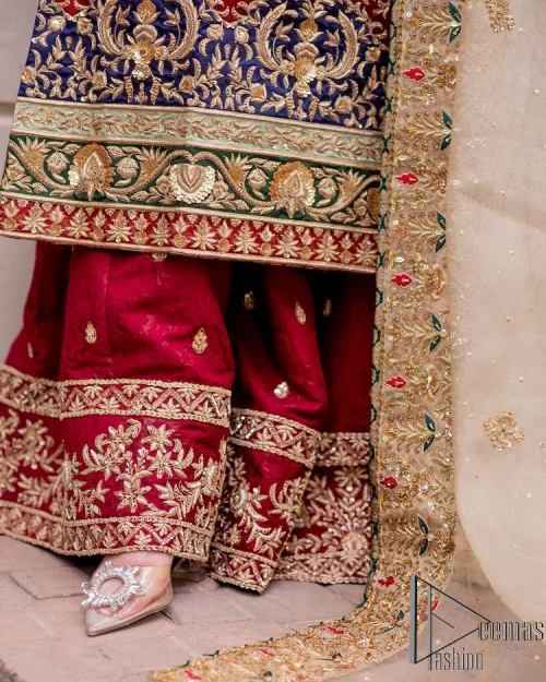 Embrace yourself with deep red on your big day. This deep red long shirt is meticulously hand-rendered with light golden