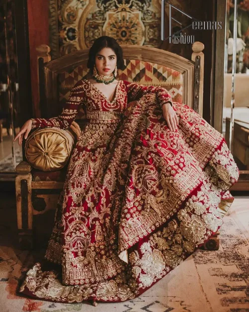 Deep red on Big day is just associated with love and romance. The deep red panelled frock is beautifully decorated
