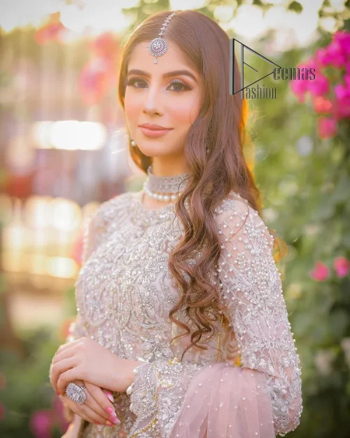 Introducing the mauve nikah outfit which begins with a short shirt that is meticulously and laboriously hand-rendered with silver embroidery